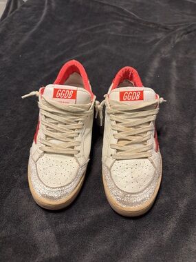 Golden Goose ball star in white leather with red star and heel tab